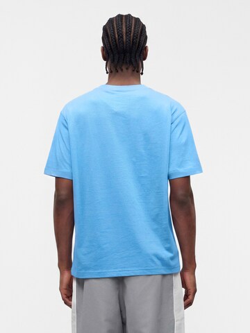 new balance Shirt 'Essential' in Blauw