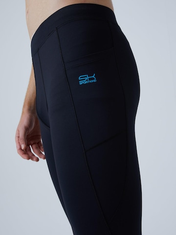 Coupe slim Pantalon de sport 'Long Running Tights' SPORTKIND en noir