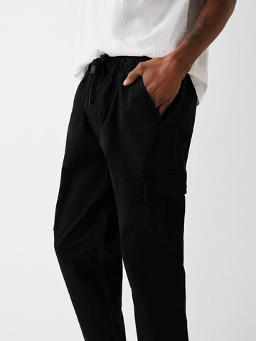 Bershka Tapered Cargo nadrágok - fekete