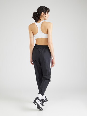 Reebok Tapered Sporthose in Schwarz