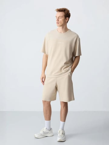Tuta da jogging di Tommy Life in beige