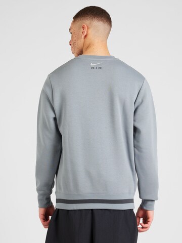 Nike SportswearSweater majica 'AIR' - siva boja