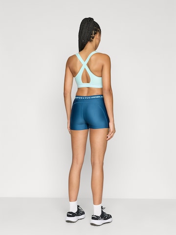 UNDER ARMOUR Skinny Sportbroek in Blauw