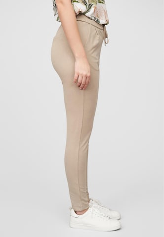 Tapered Pantaloni con pieghe di Cloud5ive in beige