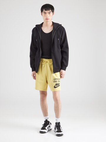 Nike Sportswear - Loosefit Pantalón 'CLUB OFFICIAL' en amarillo