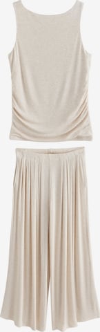 self. - Pijama en beige: frente