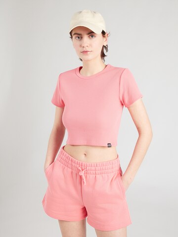 UNDER ARMOUR Koszulka funkcyjna 'Rival' w kolorze różowy: przód