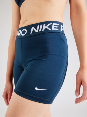 Skinny Pantalon de sport 'Pro 365' NIKE en bleu