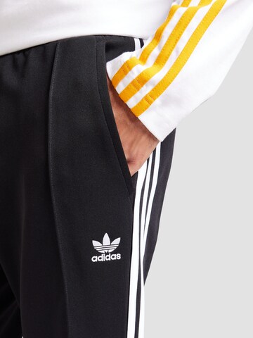 ADIDAS ORIGINALS Regular Broek '70s' in Zwart