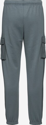 Tapered Pantaloni cu buzunare de la Champion Authentic Athletic Apparel pe gri