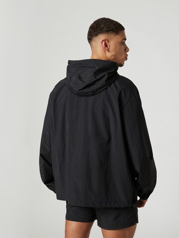 Sinned x ABOUT YOU Between-Season Jacket 'Maximilian' in Black