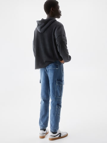 Pull&Bear Tapered Cargo jeans in Blue