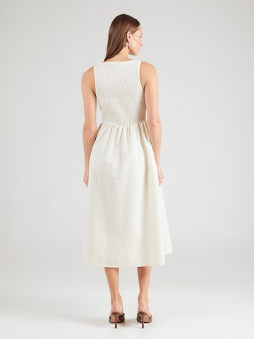 QS - Vestido en amarillo