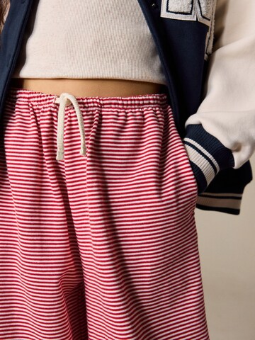 Next - Pierna ancha Pantalón en rojo