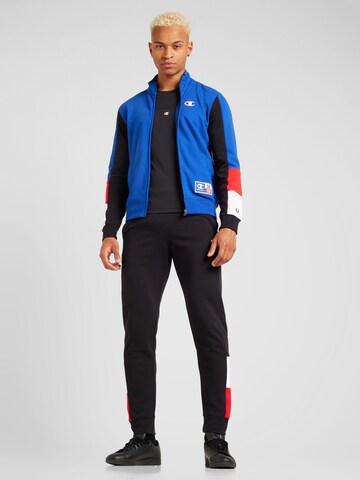 Champion Authentic Athletic Apparel Trainingspak in Blauw