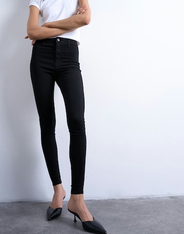 TOPSHOP Skinny Jeans 'Joni' in Black: front