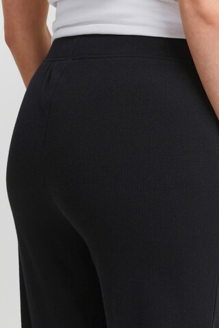 Oxmo - Tapered Pantalón 'Liz' en negro