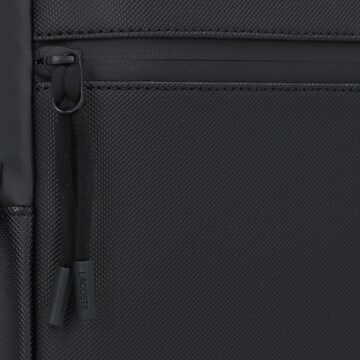 LACOSTE Skuldertaske i sort