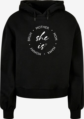 Sweat-shirt 'Mothers Day - She is' Merchcode en noir : devant
