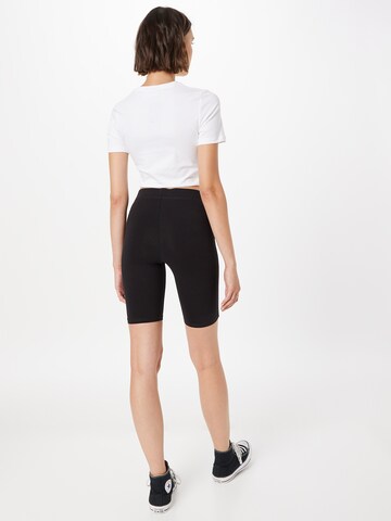 WEEKDAY Skinny Trousers in Black