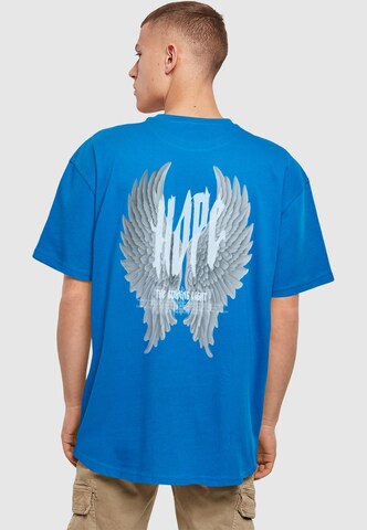 Merchcode T-Shirt 'Hope Wings' in Blau: Vorderseite