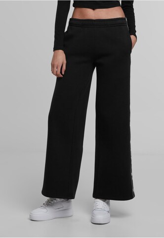 Karl Kani Wide leg Pants in Black: front