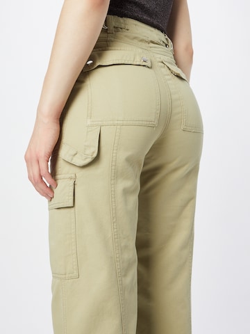 Wide leg Pantaloni cu buzunare de la Warehouse pe verde