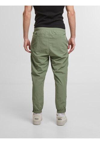 Karl Kani Tapered Pants in Green