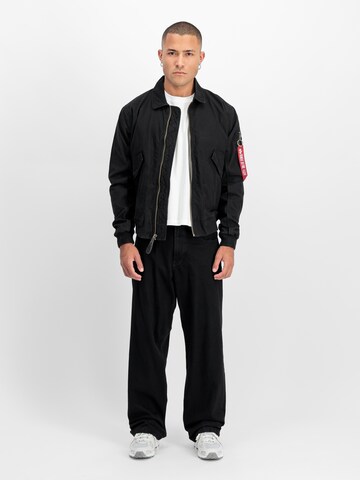 ALPHA INDUSTRIES Välikausitakki 'CWU-36/P' värissä musta