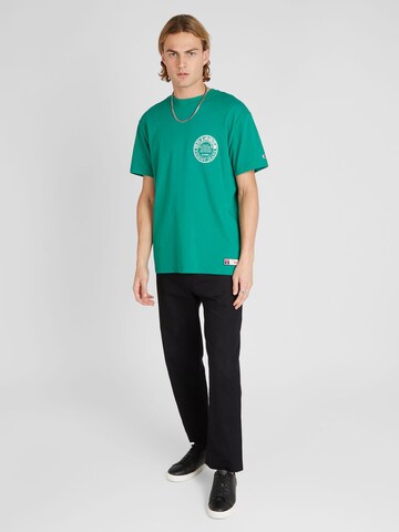 Tommy Jeans Koszulka 'ARCHIVE GAMES' w kolorze zielony