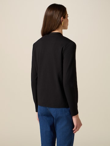 oltre - Camiseta en negro