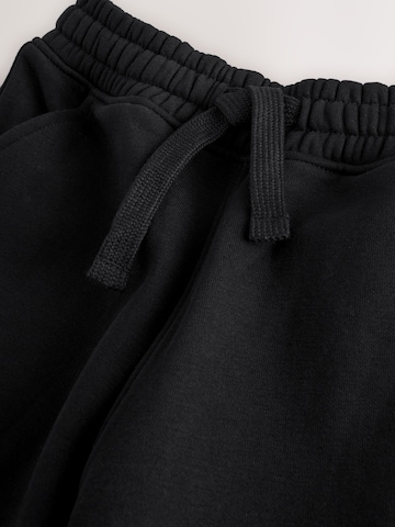 Next Jogginganzug in Schwarz