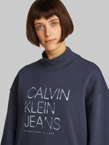 Sweat-shirt Calvin Klein Jeans en bleu