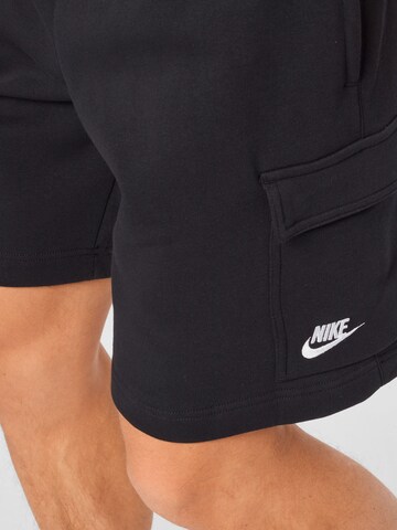 Nike Sportswear Ohlapna forma Kargo hlače | črna barva