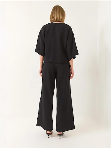 Completo pantalone di Bianco Lucci in nero