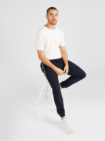 TOMMY HILFIGER Tapered Hose 'GLOBAL STRIPE' in Blau