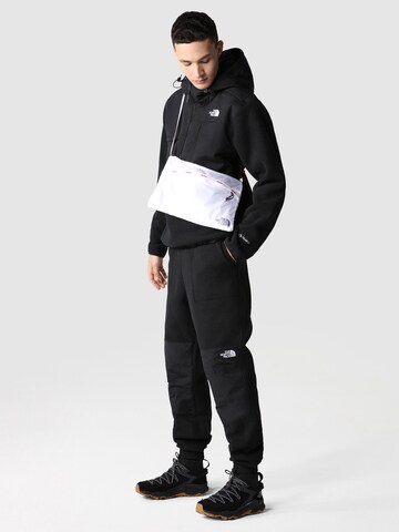 THE NORTH FACE Tapered Pants 'DENALI' in Black: front