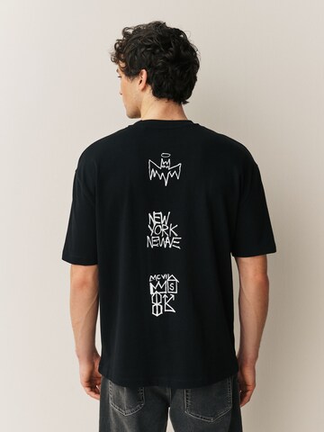 Next T-Shirt 'Künstler' in Schwarz: Vorderseite