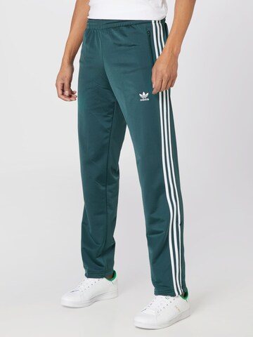 Pantaloni 'Firebird' de la ADIDAS ORIGINALS pe verde: față