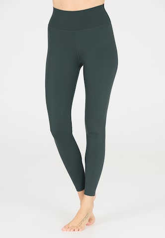 Athlecia Skinny Sports trousers 'FRANZ' in Green: front