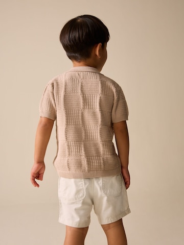 Next Neuletakki värissä beige