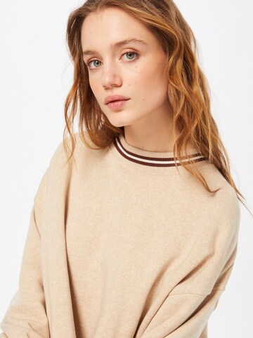 American Eagle Sweatshirt in Beige