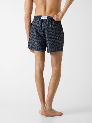 GUESS Badeshorts in Grau