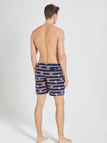 Pantaloncini da bagno 'Surfer Dude' di Shiwi in blu