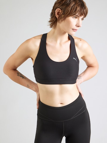 PUMA Bustier Urheilurintaliivit värissä musta: etupuoli