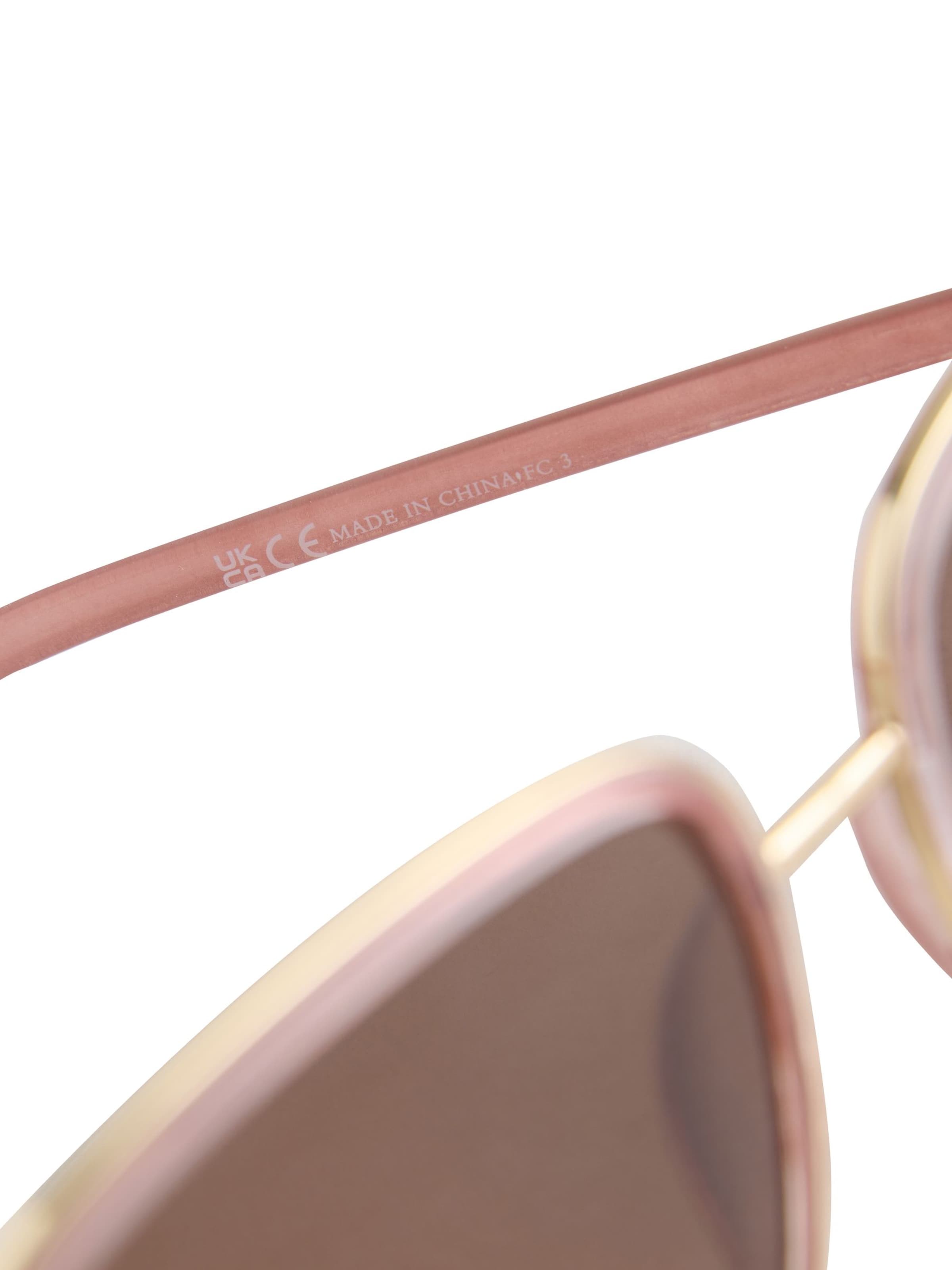 Lunettes de soleil Next en rose