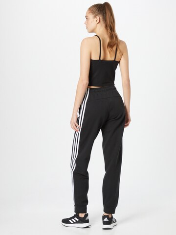 ADIDAS SPORTSWEAR Tapered Sports trousers 'Future Icons 3-Stripes' in Black