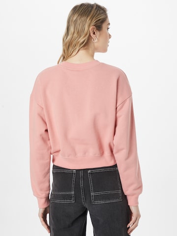 Champion Authentic Athletic Apparel Sweatshirt in Pink