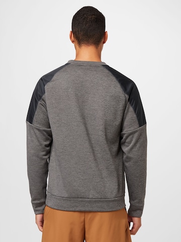 NIKE - Sweatshirt de desporto em cinzento