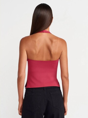 Top di Dilvin in rosa